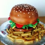 hamburger-shape-cake-covered-in-fonadant-all-edible-by-delicious-edibles-custom-cake-bakery